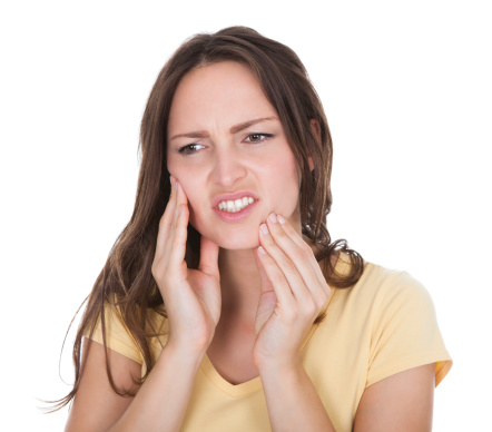 Woman with teeth pain